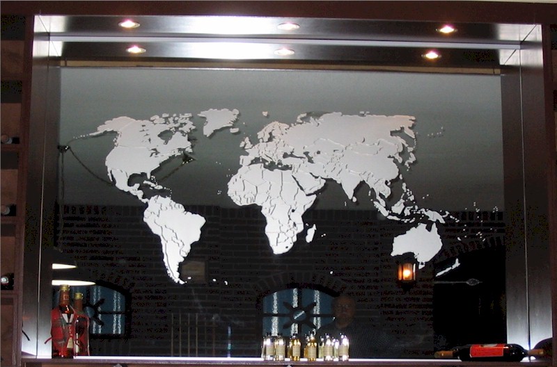 etched world map on a mirror
