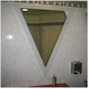 Triangle mirror with transparent edge and sandblasted corner.