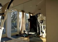 spiegelwand fitness ruimte thuis Veldhoven